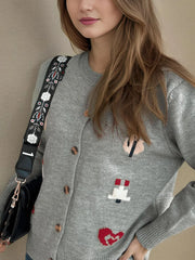 Round neck long sleeved knitted cardigan women's new three-dimensional decoration versatile loose sweater women